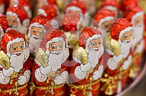 Christmas background. Santa Claus chocolates.