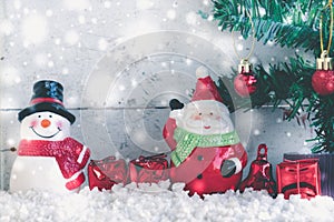 Christmas background with santa claus and snowman