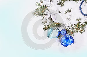 Christmas background with silver and blue baubles
