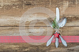 Christmas background with silverware place setting for festive holiday dinner