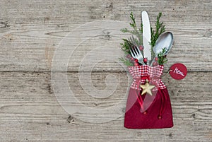 Christmas background with silverware place setting for festive holiday dinner