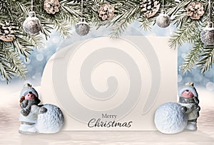 Christmas background snow filed, fir branches, decorations and empty paper for your text.