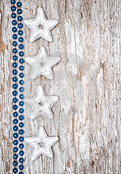 Christmas background with star shapes and chaplet