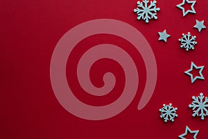 Christmas background.Stars and snowflakes on red background.