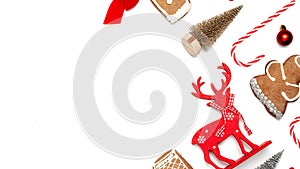 Christmas background. Stocking, gifts, winter tree, ribbon and bow in shape frame on white background for greeting card. Winter