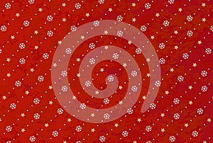 Christmas background of white snowflakes and golden stars on a red background.