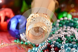 Christmas background with wine bottle and pearls