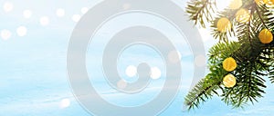 Christmas background. Xmas tree with garland lights holiday decoration, snowy holiday festive backdround. Banner Widescreen frame