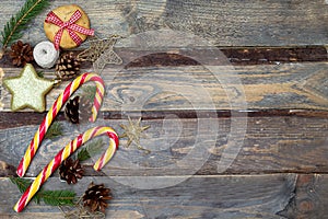 Christmas backgrounds. Christmas toys, Christmas candies on a wooden background