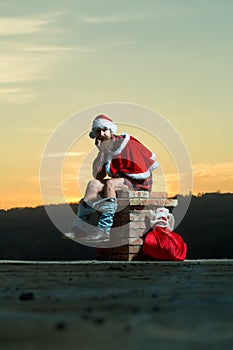 Christmas bad santa on chimney