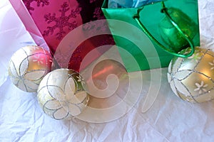 Christmas bags and ornaments on white background