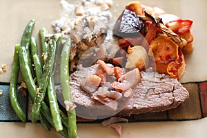 Christmas baked dinner with meat and vegetables