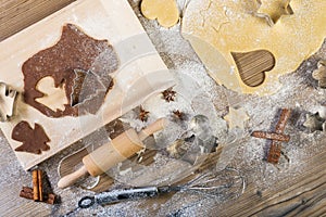 Christmas baking, all on the table: pasta, cake form, meal, providing wood, spices