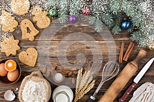 Christmas baking background culinary background with spices and Christmas winter ingredients for baking on a vintage wooden table