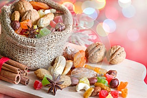 Christmas baking concept with nuts and dried fruits in the kitchen