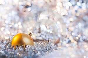 Christmas ball on abstract light background