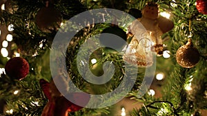 Christmas ball, fairy garland and lights decoration on tree