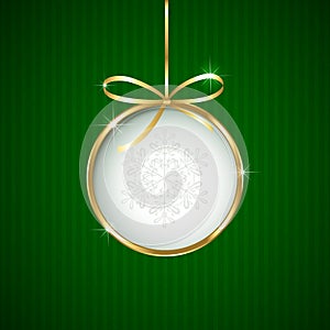 Christmas ball on green background