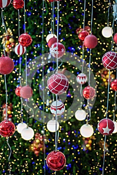 Christmas ball haning on a Christmas tree photo