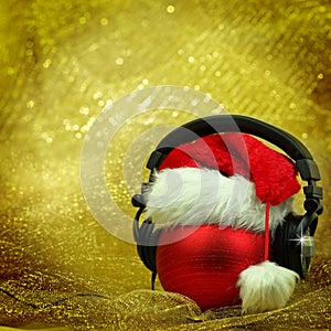 Christmas ball with headphones photo