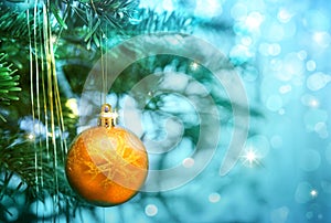 Christmas ball isolated on blue blur background.