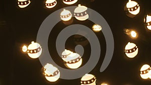 Christmas ball shape light overlay on black background