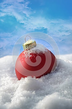 Christmas Ball in snow, close up