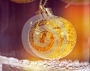 Christmas ball in water with bubbles, Christmas card concept