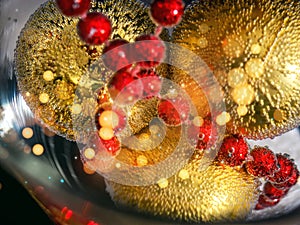 Christmas ball in water with bubbles, Christmas card concept