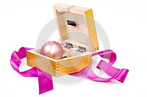 Christmas ball in wooden box as gift