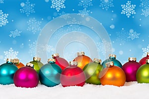 Christmas balls baubles many colorful background copyspace copy space card decoration snowflakes snow winter