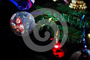 Christmas balls on the Christmas tree branch. Magic lights