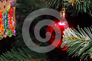 Christmas balls on the Christmas tree branch. Magic lights