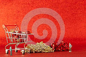 Christmas balls and with decoration on Defocused red lights background.