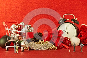 Christmas balls and with decoration on Defocused red lights background.