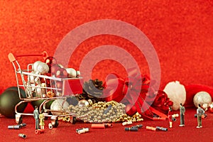 Christmas balls and with decoration on Defocused red lights background.