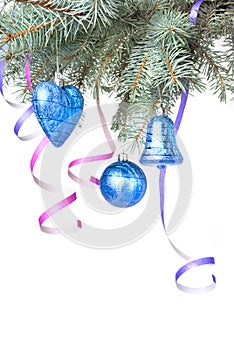 Christmas balls and decoration on fir tree branch