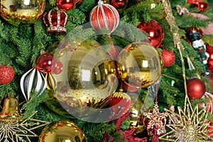 Christmas balls toys on fir tree. New Year holidays and Christmastime celebration. photo