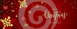 Christmas Balls and Gifts with Golden Holiday Bow on Red Background