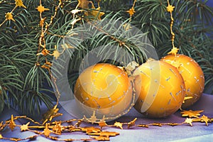 Christmas Balls gold and branch everygreen tree