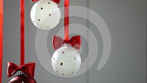 Christmas balls hanging with ribbons