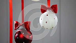 Christmas balls hanging with ribbons