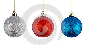 Christmas balls hanging on a white background.