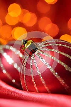 Christmas balls on red silk