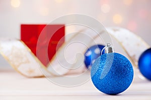 Christmas balls, ribbon and gift box