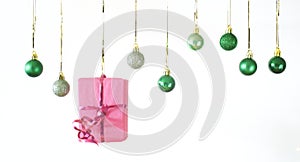 Christmas balls in a row, wrapped present, on white background, merry christmas,free copy space