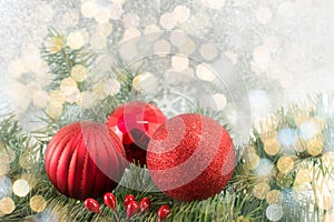 Christmas balls on shiny silver background