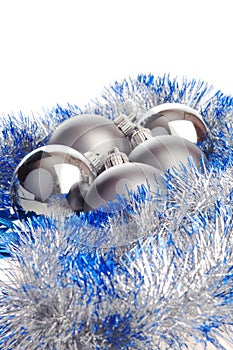 Christmas balls with silver and blue tinsel
