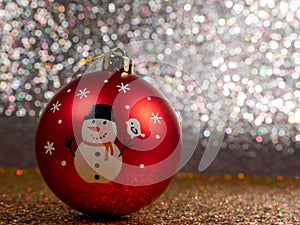 Christmas balls on a silvery background. Christmas decoration with beautiful bokeh.