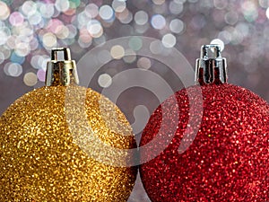 Christmas balls on a silvery background. Christmas decoration with beautiful bokeh.